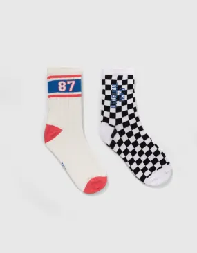 Chaussettes noires damier et blanches rayures