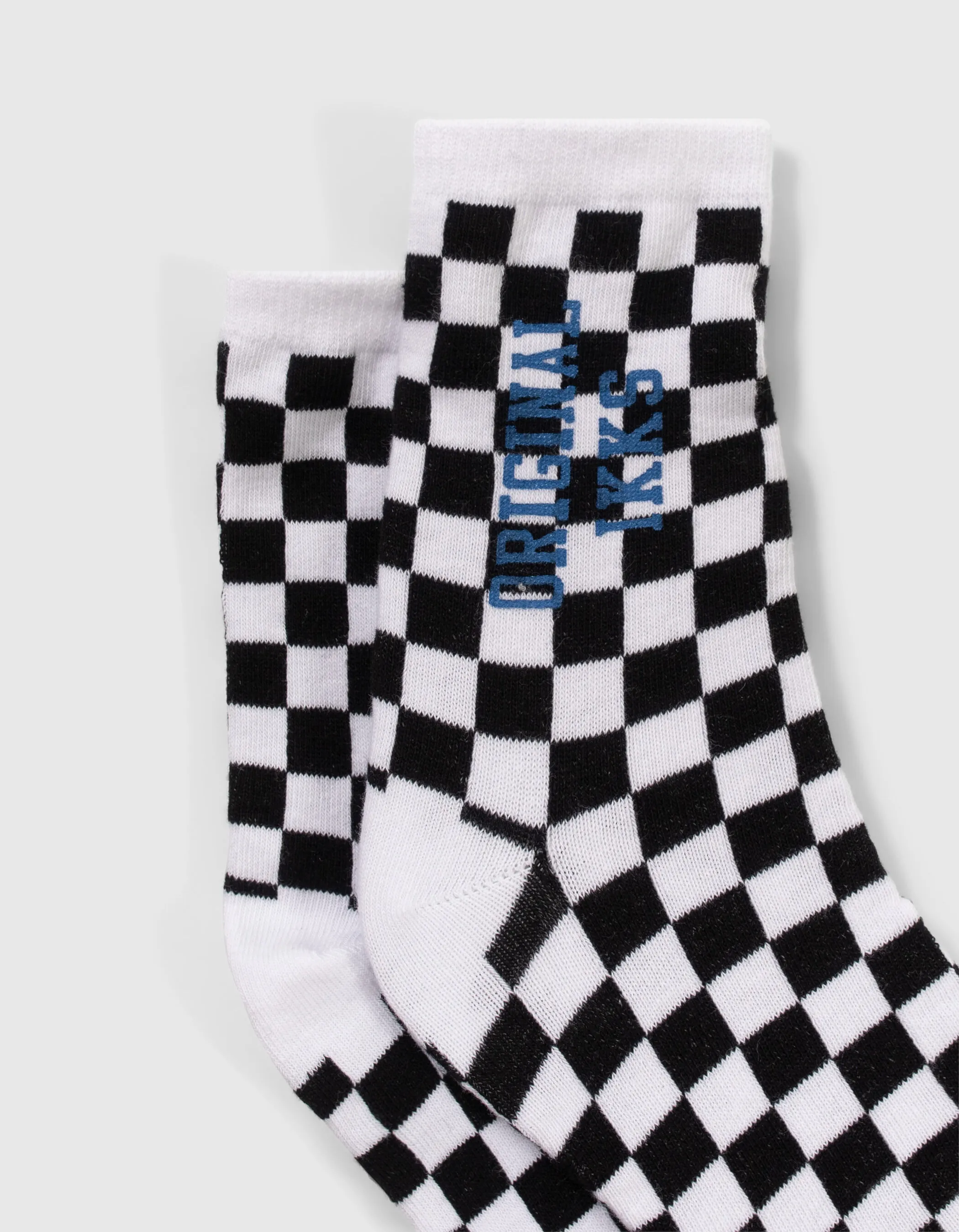 Chaussettes noires damier et blanches rayures